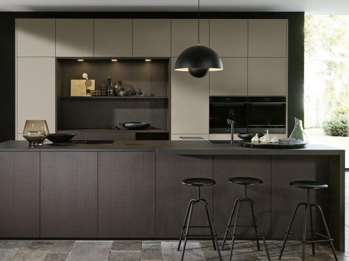 A dark & trendy two tone kitchen with fluted effect cabinets